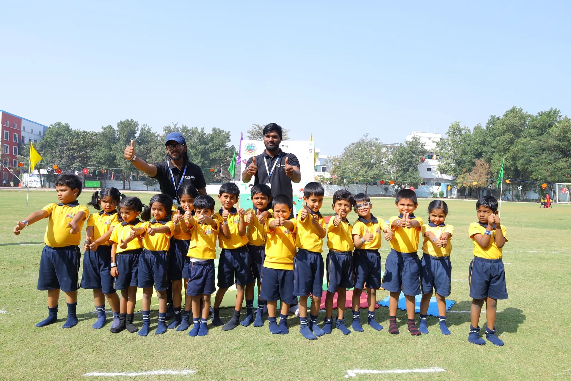 First Mile Athletes & Coach Thumbs Up Celebration